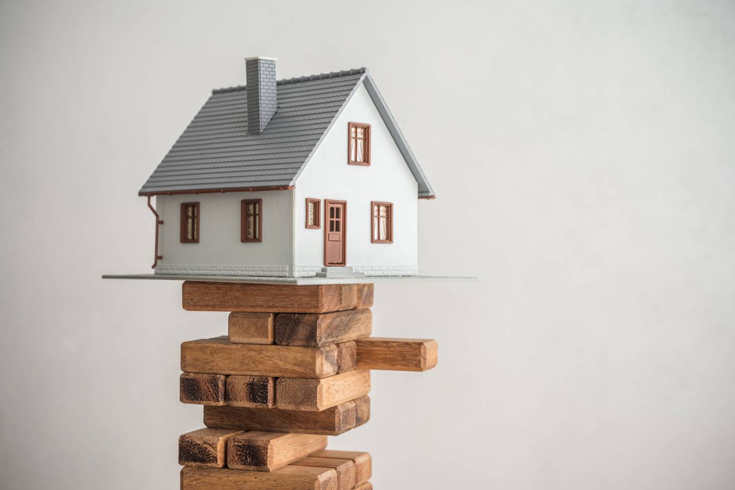 house model on wooden bricks