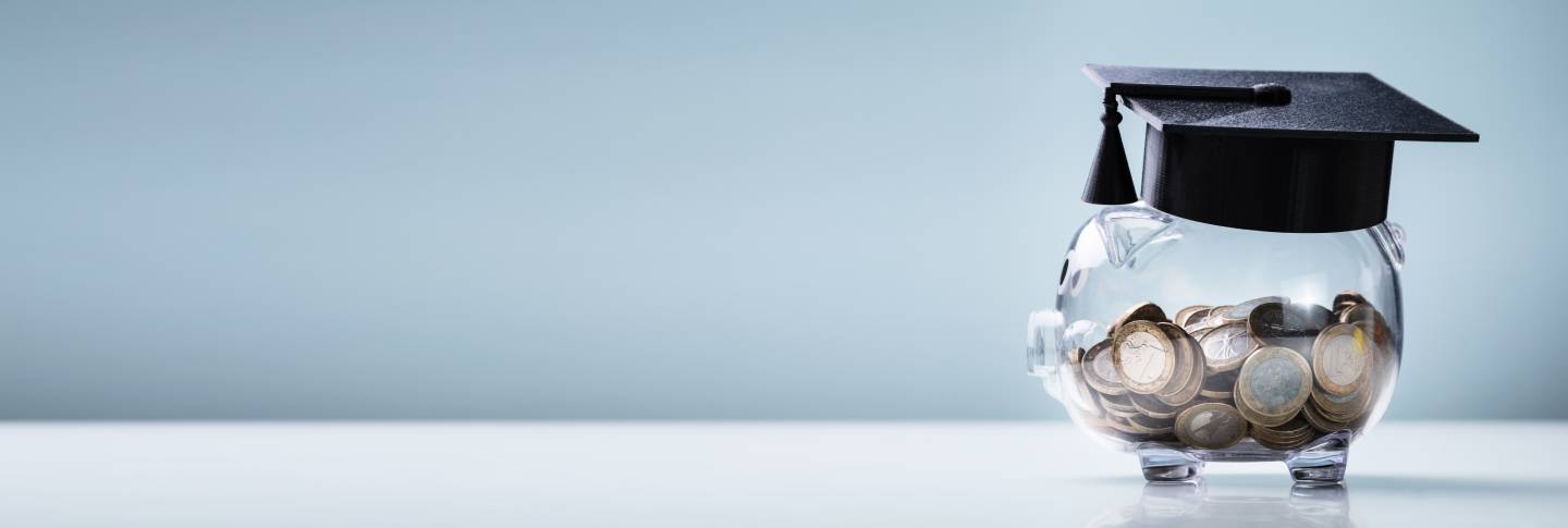 A blue background with a piggybank