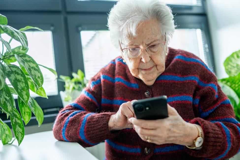Senior facing phone scams and digital safety.
