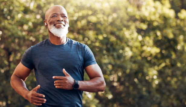 A man running and smiling