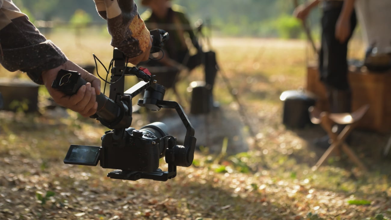 A movie set - with someone holding a camera filming 