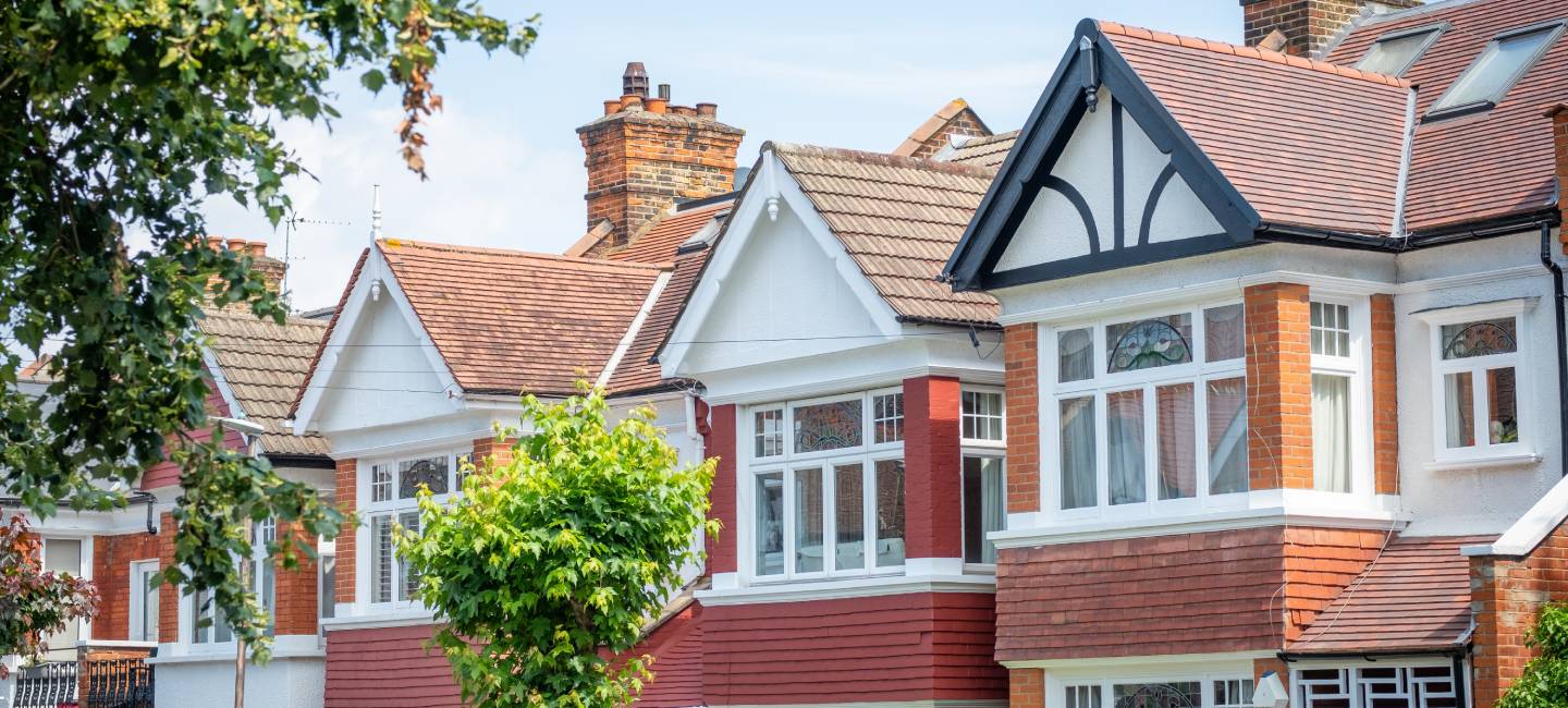 UK- Row of typical brick terraced houses in Wimbledon, south west London