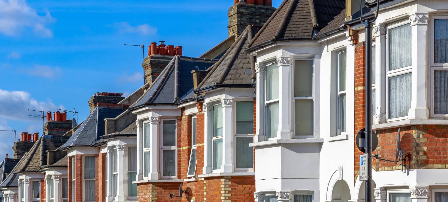 Row of typical English terraced houses in West Hampstead, London