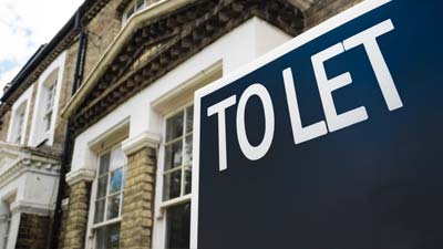 'To Let' sign outside a house