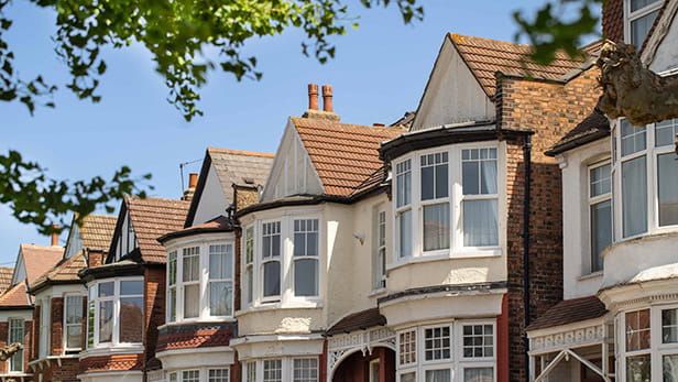 A row of Edwardian houses on a blue sky day
