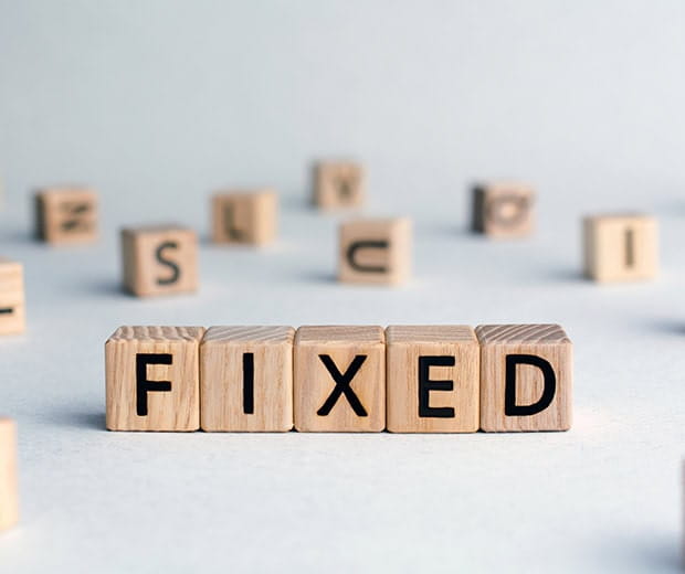 The word fixed arranged from wooden toy blocks.